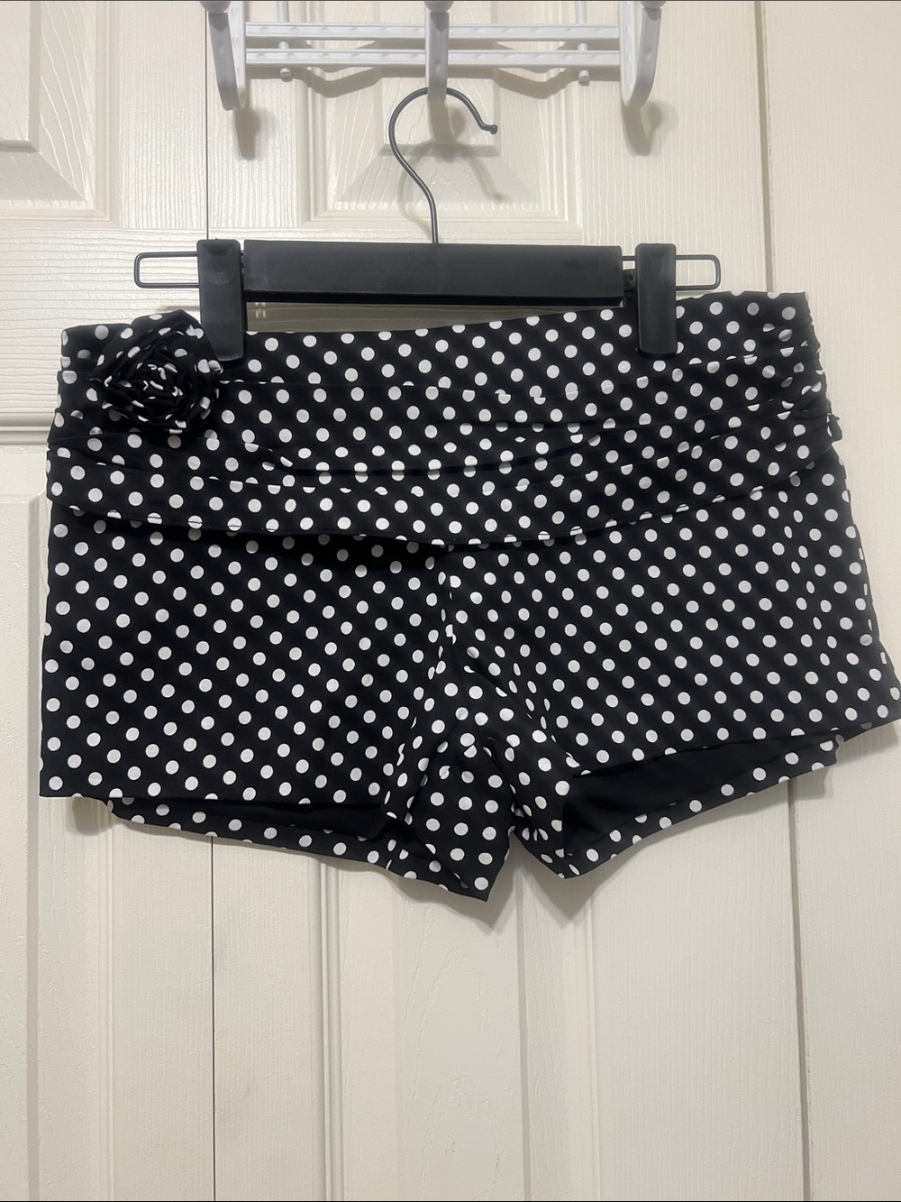 Outcast women’s  Black Polka Dot  Shorts with Rosette. Never worn. Size S
